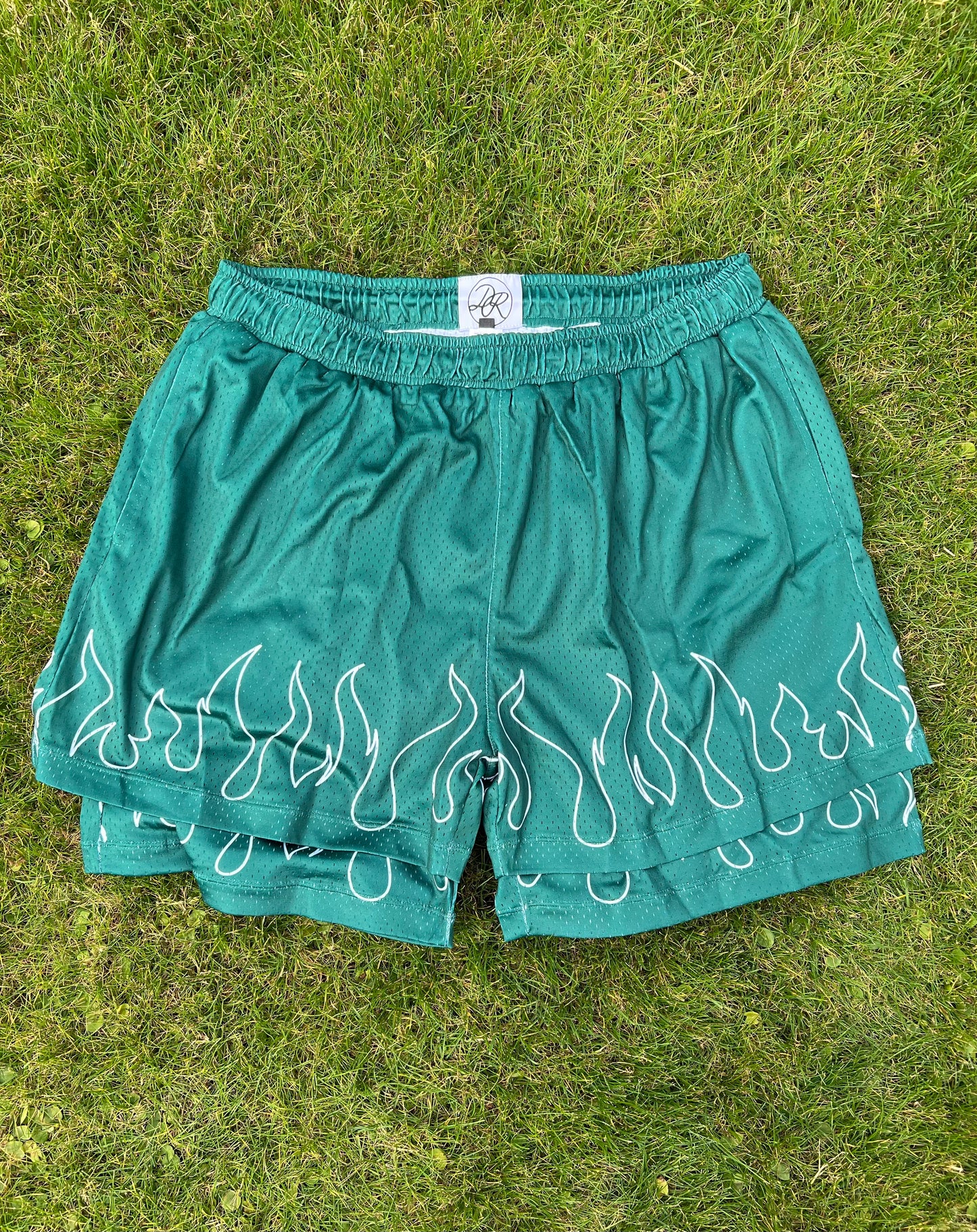 Blazing Style: Green Flames Shorts for a Fiery Look