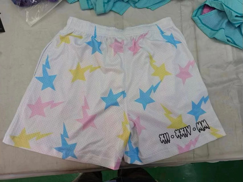 Starry Delight: White Shorts with Colorful Printed Stars